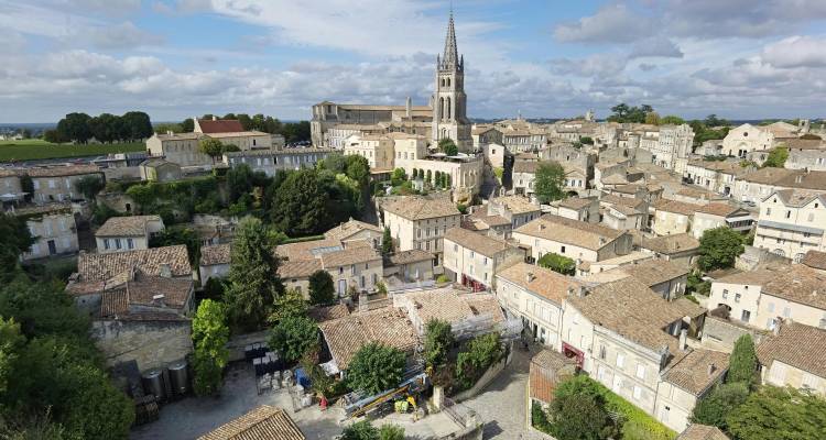 Aerial panorama of the medieval village of Saint-Émilion with its prominent church bell tower