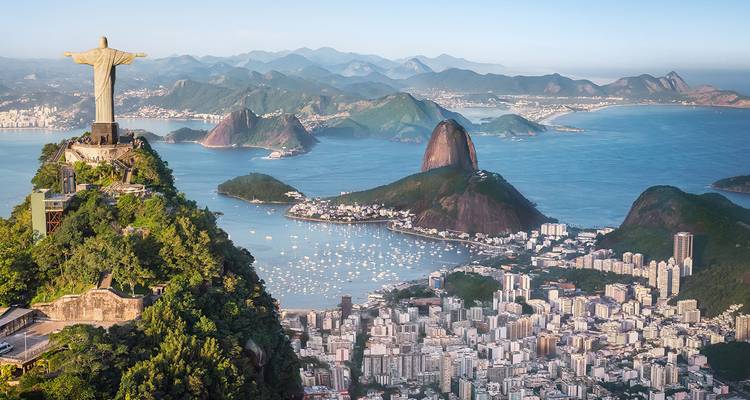 Aerial of Rio de Janeiro with Christ the Redeemer overlooking Sugarloaf Mountain and Guanabara Bay