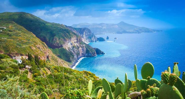 Sweeping view of rugged Aeolian island coastline and deep blue Tyrrhenian Sea