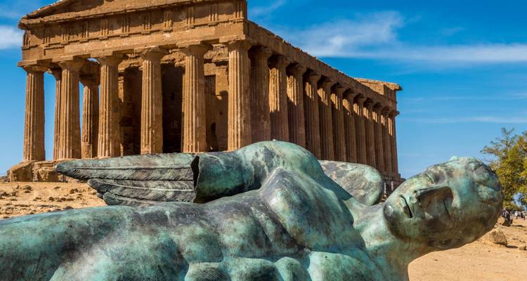 Ancient Temple of Concordia with large fallen bronze statue in the Valley of Temples