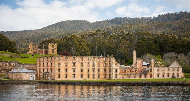 Historic sandstone ruins of Port Arthur penal colony viewed from the water