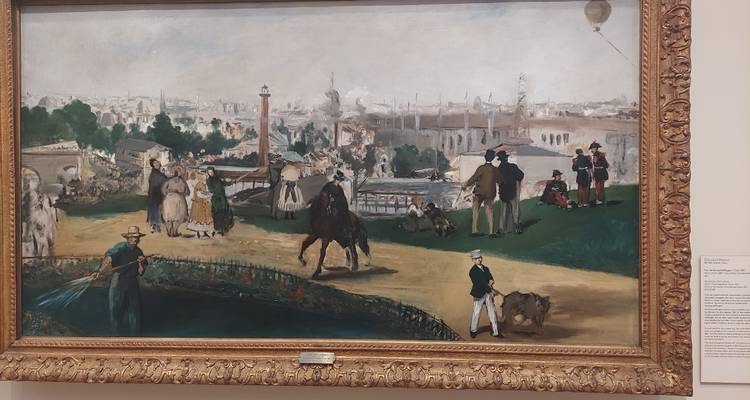 Framed painting displayed on a museum wall with informational plaque beside it.