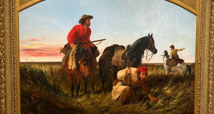 Peinture de cavaliers de la frontière à cheval traversant les hautes herbes de la prairie sous un ciel coloré.