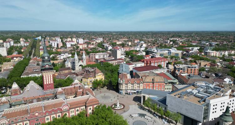 Drone view of vibrant central square and eclectic architecture of a European city