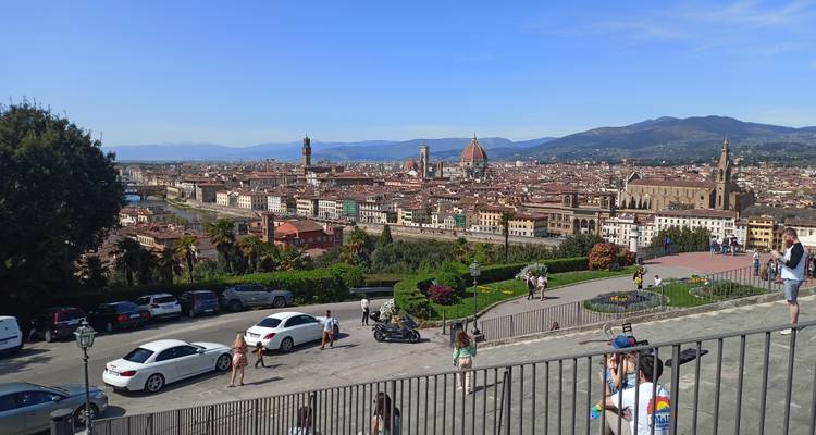 Panoramic overlook of Florence skyline including Duomo and Arno River viewed from Piazzale Michelangelo.