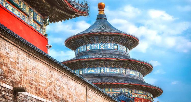 Close-up of the colorful circular Hall of Prayer for Good Harvests at Beijing’s Temple of Heaven against blue sky.