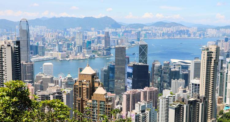 Daytime panorama of Hong Kong skyline and Victoria Harbour viewed from Victoria Peak.