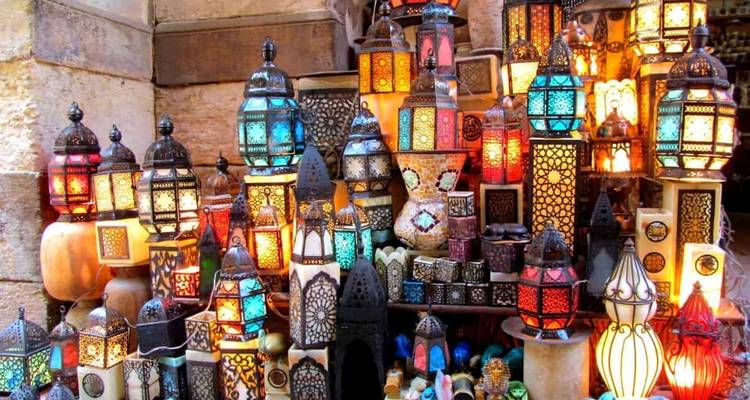 Colorful array of traditional Egyptian lanterns displayed in a market stall.