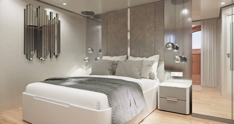Camarote luminoso con ropa de cama lujosa, paneles de pared metálicos e iluminación ambiental suave.