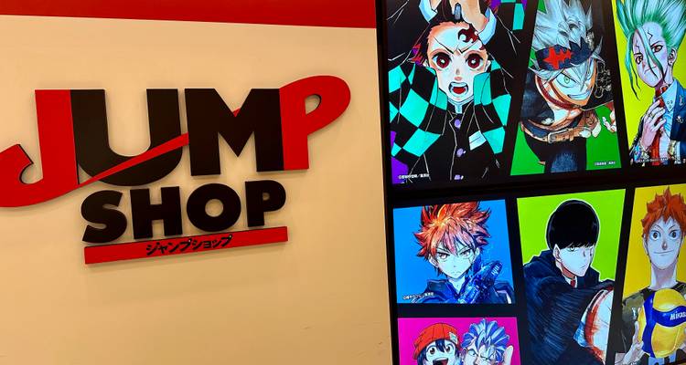 JUMP Shop sign alongside colorful anime character screens inside a mall.