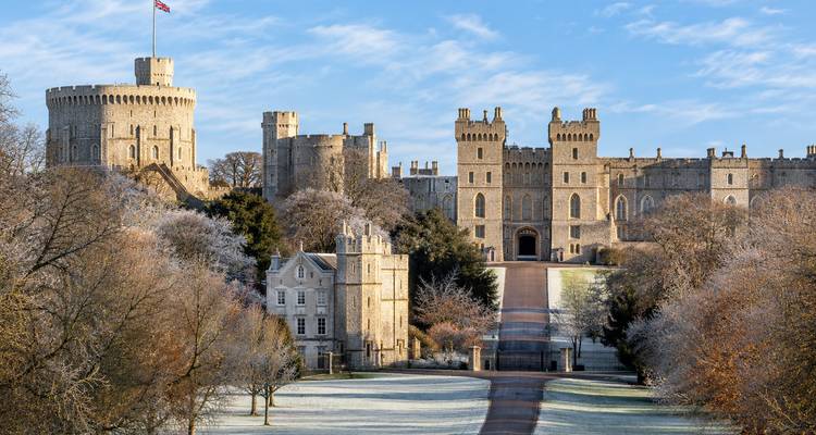 Majestic frost-tipped Windsor Castle seen from the Long Walk on a crisp winter morning.