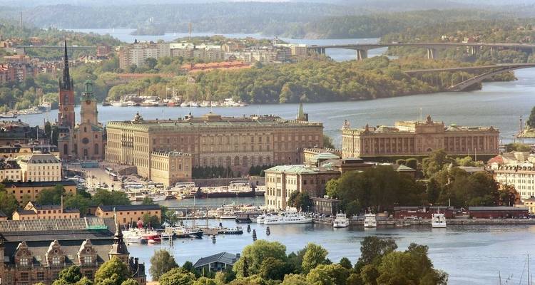 Cityscape with historical buildings and waterways.