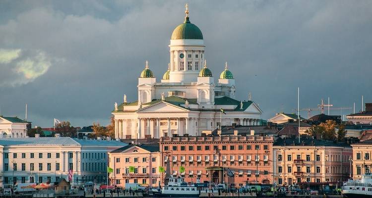 Dome-topped cathedral in a Nordic urban environment.