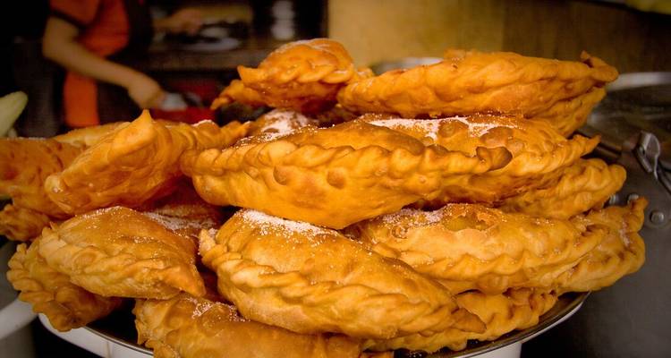 Close-up of freshly fried empanadas.