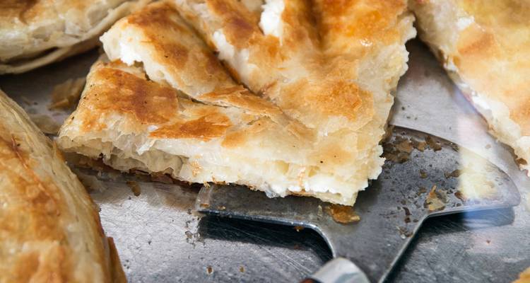 Close-up of a baked pastry on a spatula.