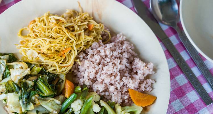 Plate of noodles, rice, and vegetables.