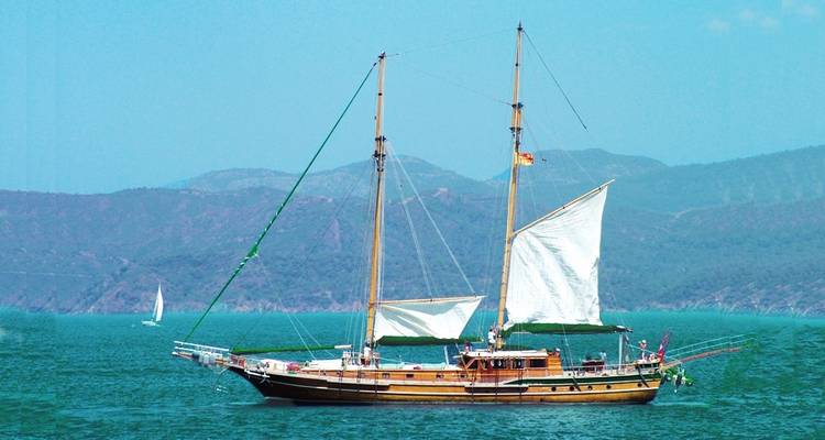 Sailboat with two sails on the water.