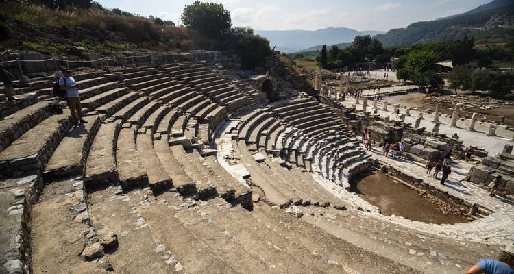 Amphitheater ruins with concentric seating rows.