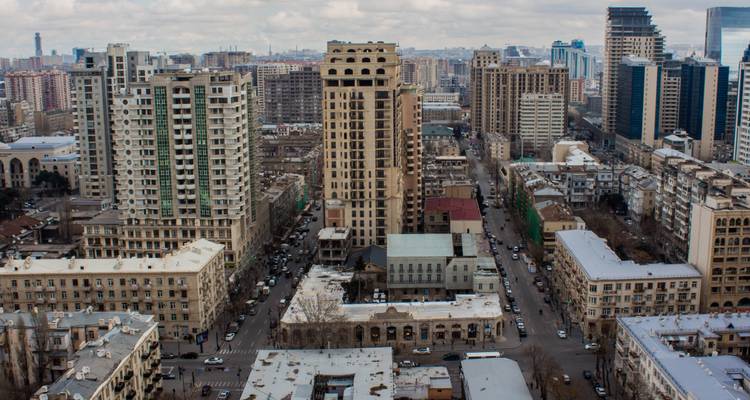 Dense cityscape of Baku with modern and old architecture.