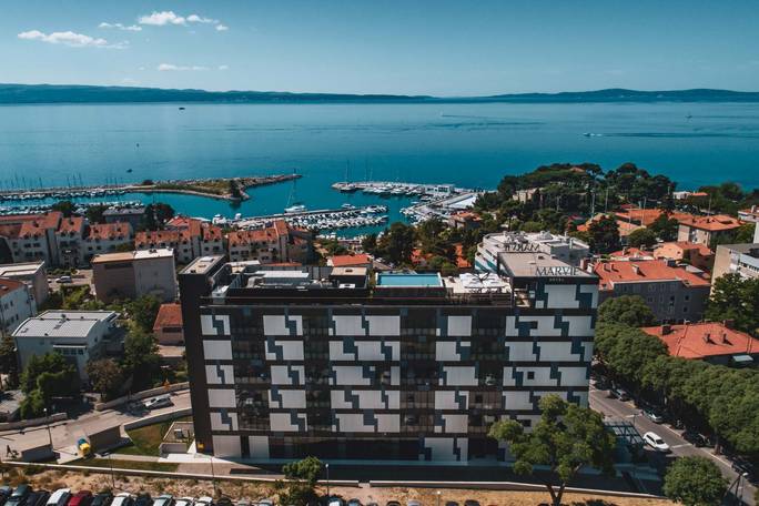 
Marvie Hotel & Health in Split is a modern 4-star hotel with a wellness focus, featuring indoor and rooftop pools, a full spa and fitness center, and comfortable contemporary rooms.