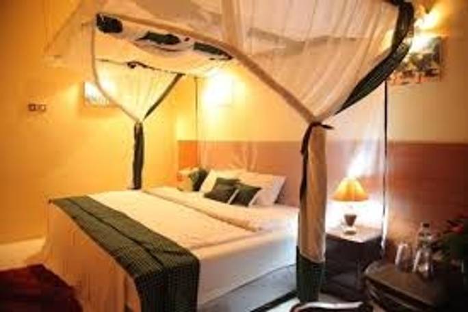 KING BED AT HIGVIEW COFFEE LODGE