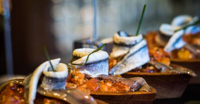 Close up of seafood pintxos at a bar in San Sebastian, Spain