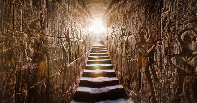 A passageway inside a tomb and temple, a popular site on a Nile river cruise in Egypt