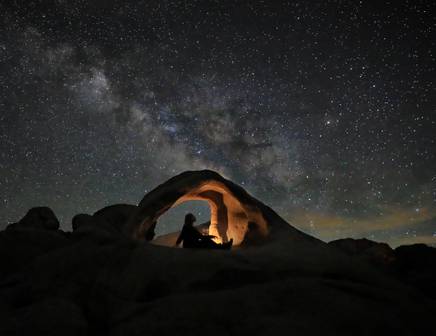 A woman wandering through the canyonlands of the United States