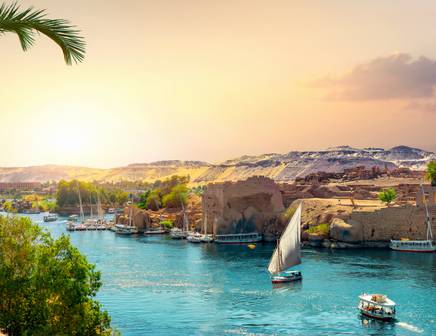 view of the golden sunset behind the river nile in egypt
