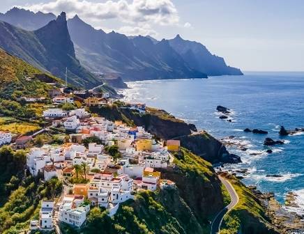 the colourful houses on the coastline of tenerife