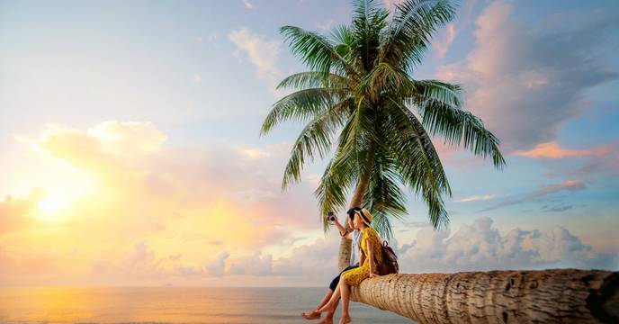 A couple enjoying a romantic moment on the beach in the Maldives