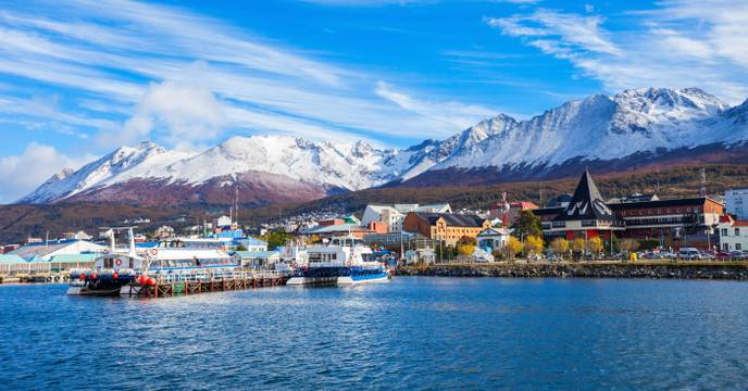 The port town of Ushuaia with mountains in the background