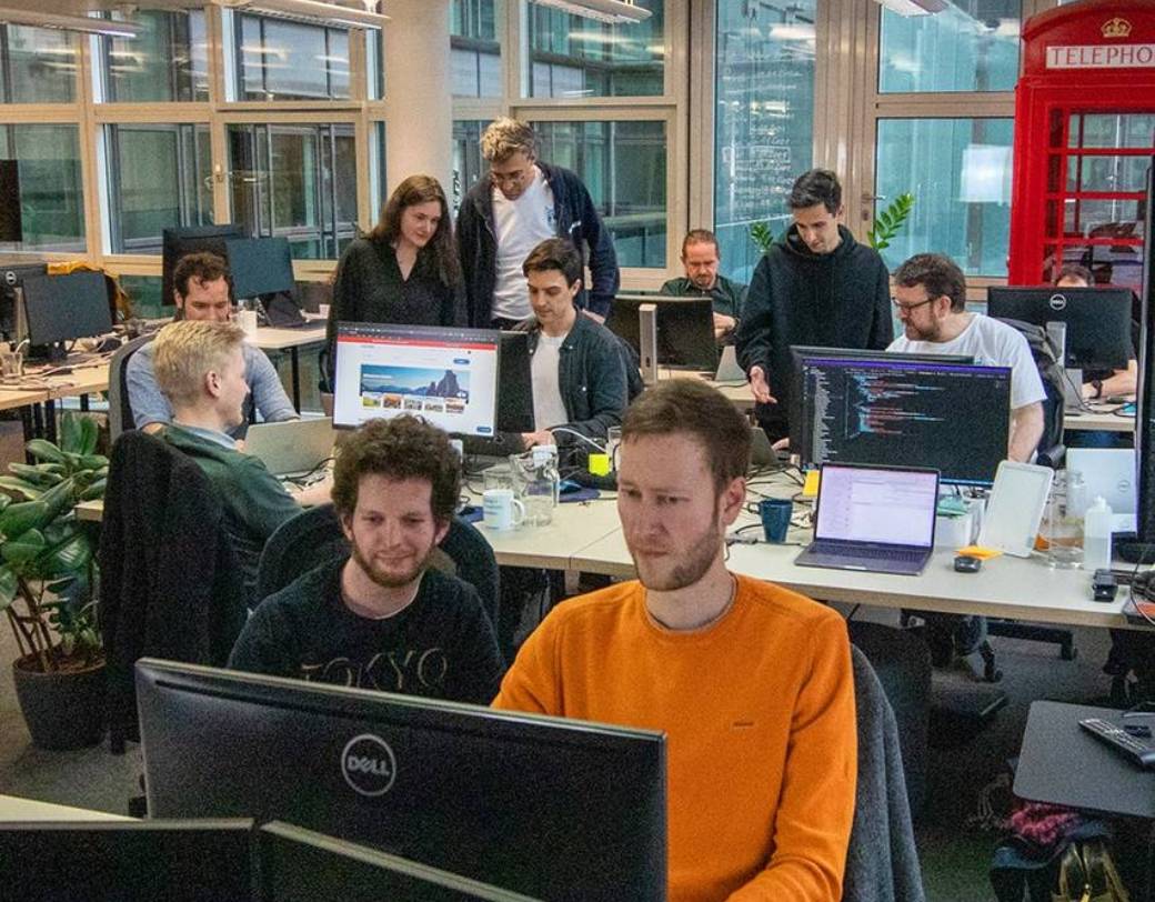 The Engineering team collaborating on projects together at TourRadar