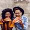 A couple enjoying pizza