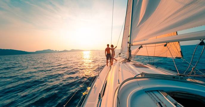 A couple sunset sailing