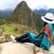 Woman marveling at the view of Machu Picchu