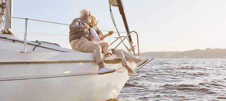 Senior couple enjoying sailing in Italy