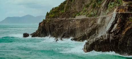 Waves lapping against coastal rocks