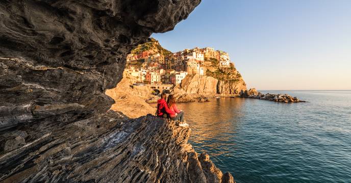 Couple enjoying a view of a colorful village