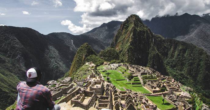 A person enjoying the view from Huayna Picchu