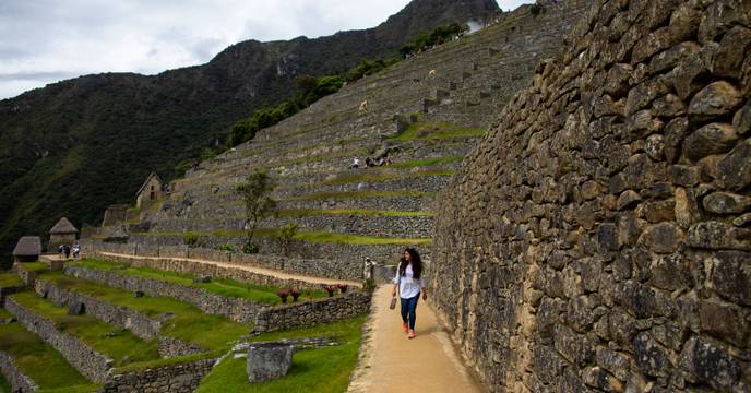 A woman exploring ancient ruins