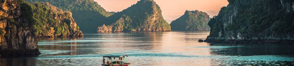 A boat cruising the beautiful Halong Bay, Vietnam