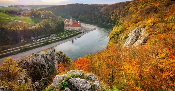 A river and monastery in Europe