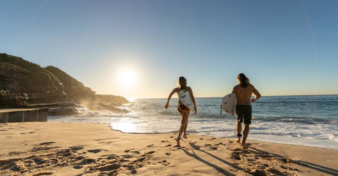 Surfers on a beach