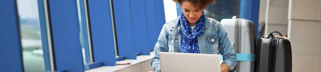 Femal traveler with laptop