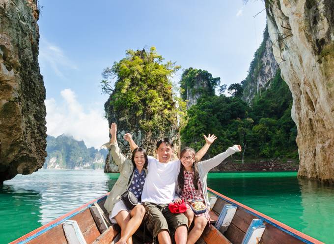 family on a boat trip in Thailand