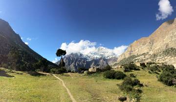 Spectacular view of a mountain range with snow-capped peaks.