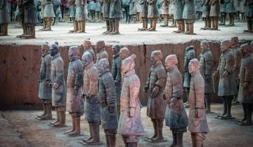 Terracotta warriors in an excavation site.