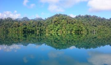 Scenic view of a lake with perfect reflections of the forested hills.
