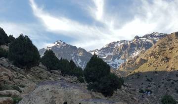 Mountain landscape with snow-capped peaks.